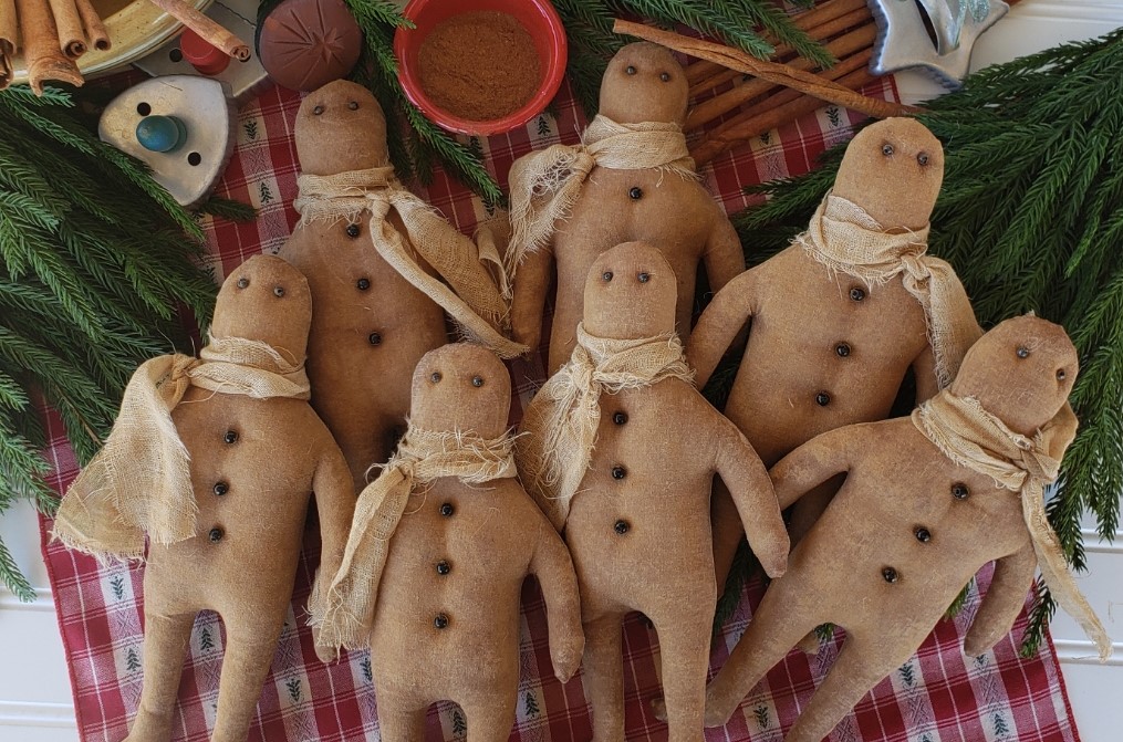 Handmade primitive gingerbread man ornament, rustic farmhouse Christmas décor with grungy finish, stitched details, and button accent