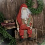 Handmade primitive vintage folk art Santa Claus, rustic farmhouse Christmas décor with wool beard and quilted accent.