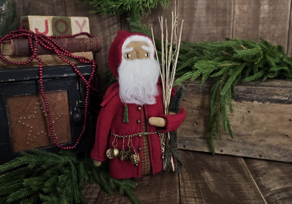 Handmade primitive wool Santa Claus, rustic farmhouse Christmas décor with wool beard, red coat, and vintage embellishments