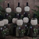 Handmade primitive wool snowman shelf sitter, rustic farmhouse Christmas décor with scarf, stovepipe hat, and snowflake detail