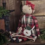 Handmade primitive snowman doll named Merry, rustic farmhouse Christmas décor crafted from vintage fabrics