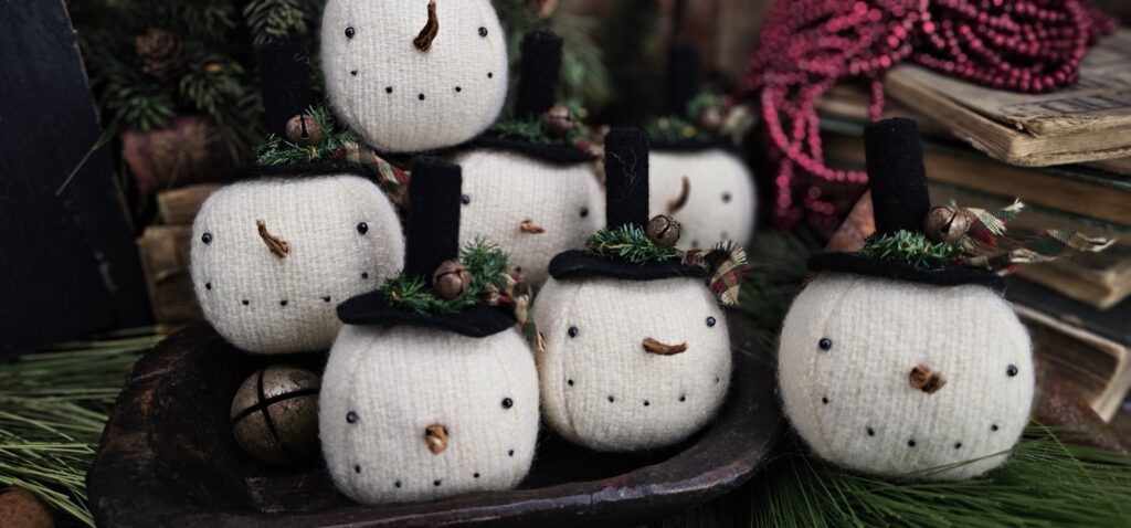 Handmade primitive wool snowman ornament, rustic farmhouse Christmas décor with snowball head, wool hat, and jingle bell accent