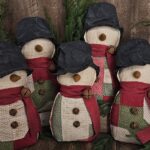 Handmade primitive quilted snowman crafted from a repurposed vintage patchwork quilt, rustic farmhouse Christmas décor with wool scarf and carrot nose
