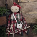 Handmade primitive snowman doll, rustic farmhouse Christmas décor shelf sitter with flannel dress, carrot nose, and stitched smile