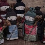 Handmade primitive quilted snowman shelf sitter, rustic farmhouse Christmas décor with antique quilt body, wool hat, and twig nose