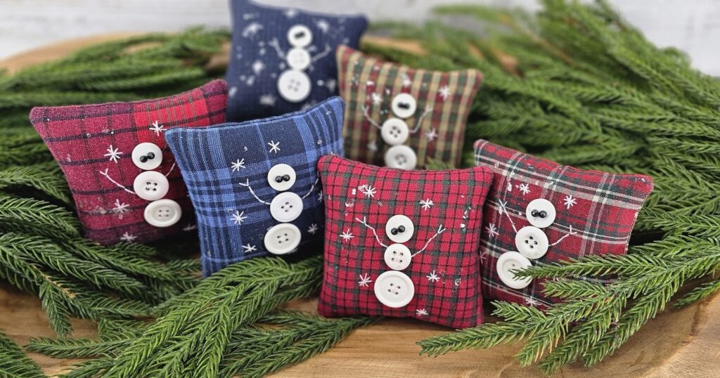 Handmade primitive snowman button pillow, rustic farmhouse Christmas décor bowl filler with stitched buttons and bead eyes