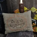 Rustic Halloween pillow tuck with freehand “31” and attic‑style aged finish.