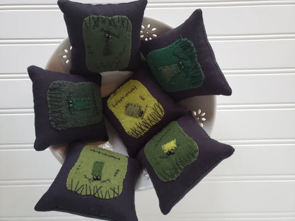 Handmade Halloween Frankenstein set with wool fabric faces and homespun bases