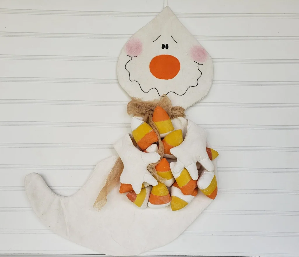 Primitive Candy Corn Ghost door greeter sewing pattern, 25-inch fall Halloween décor with candies.