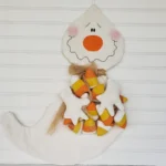 Primitive Candy Corn Ghost door greeter sewing pattern, 25-inch fall Halloween décor with candies.