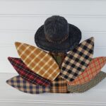 Back view of primitive homespun Thanksgiving turkey showing patchwork fabrics, wool collar, and aged rustic finish.