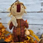 Close‑up of primitive fall plaid homespun fabric used for scarecrow body option
