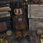 Primitive Jack O’Lantern doll with removable tophat, stitched face, and wool overalls